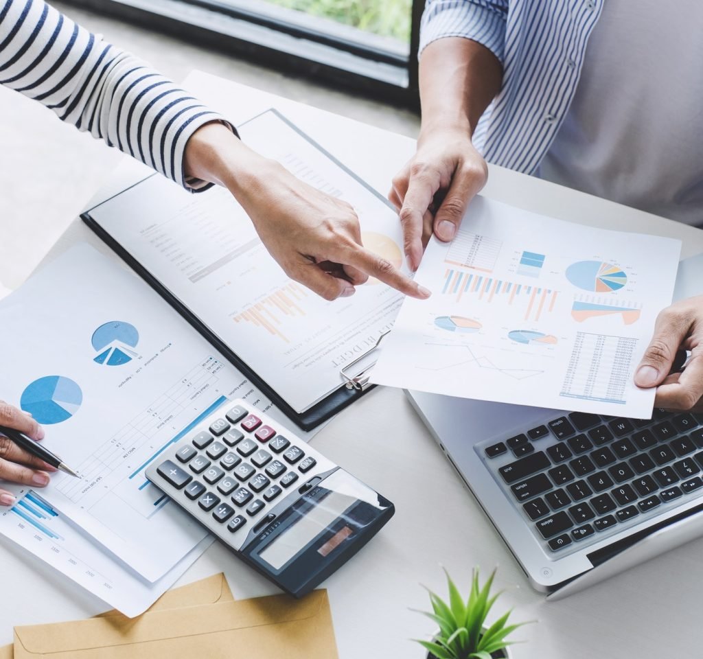 business team collaboration discussing working analysis with financial data and marketing growth.jpg